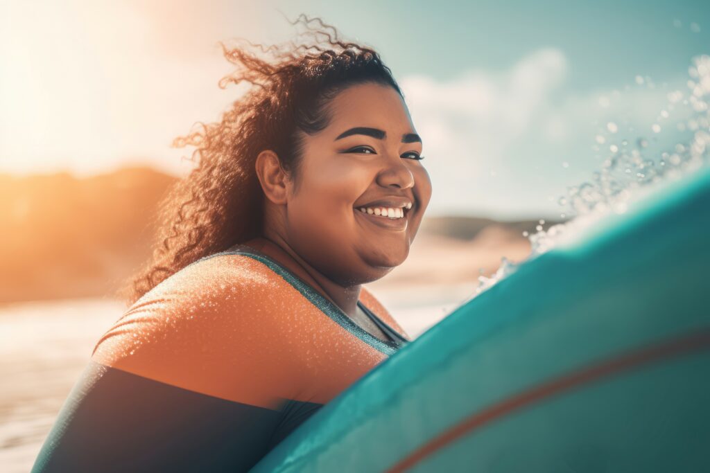 Plus size woman smiling at surfing. 